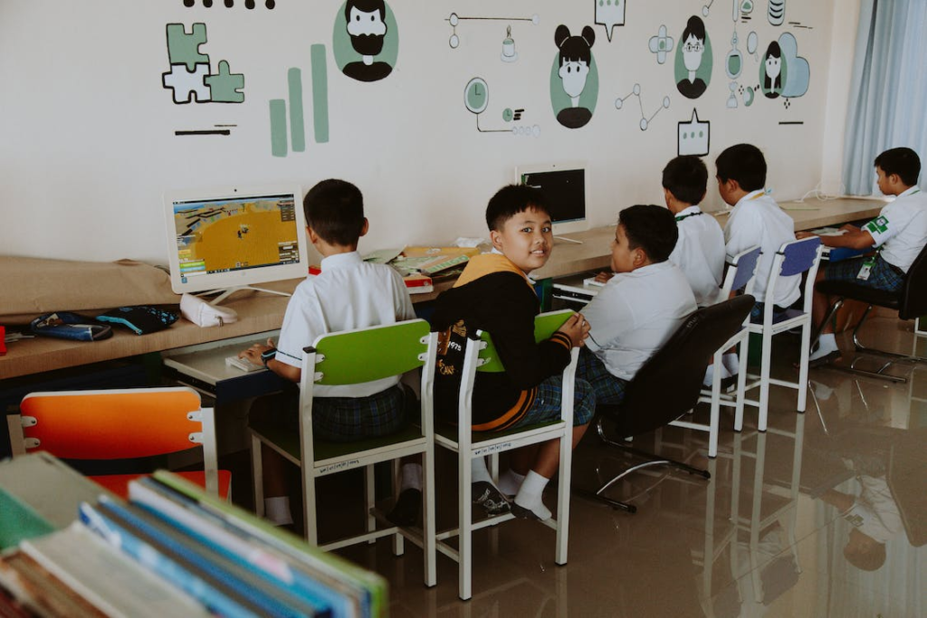 A class of students in a computer lab.