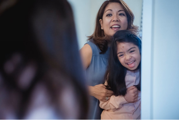 A mother spending time with her autistic daughter