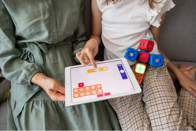 A neurodiverse kid using a tablet