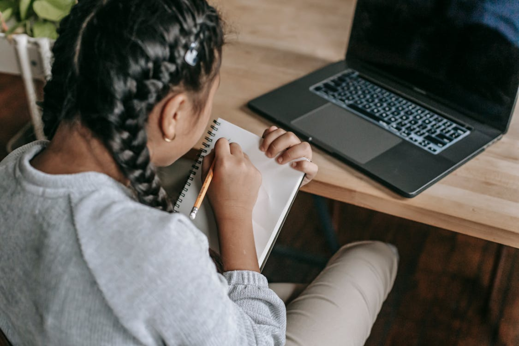 A girl using a laptop during her study time