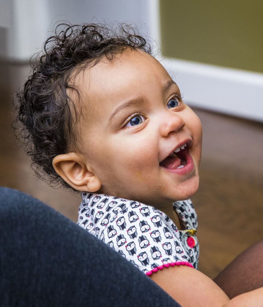 A cute toddler smiling