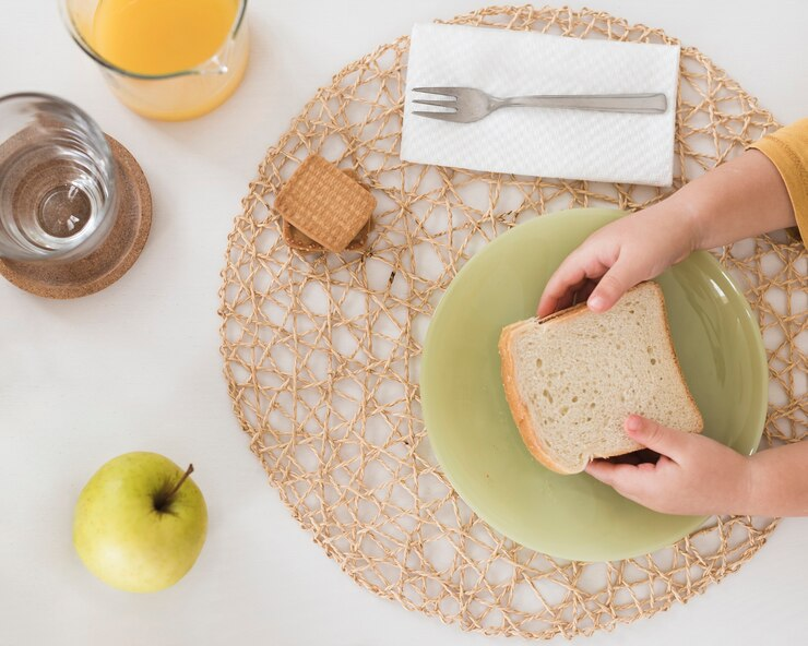 A top view of a child having breakfast